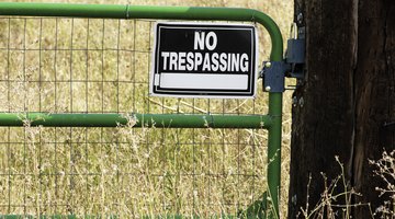 Locked Metal Gate with Sign