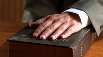 Hand on bible, swearing in