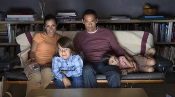 Family watching television together