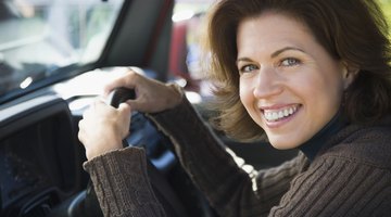 Portrait of a woman sitting in a car