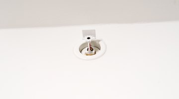 Sprinkler on wall near ceiling