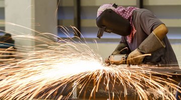 Electric wheel grinding on steel structure
