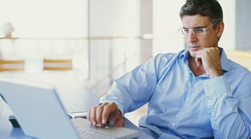 businessman using a laptop in an office