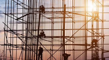 construction workers in the sunset